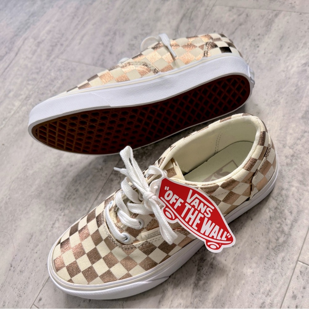 Vans Rose Gold/ Off-white Checkered
Authentic shoes. W 6.5. NWOB